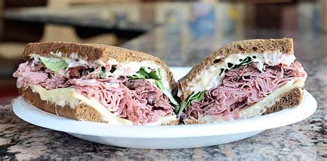Brooklyn pickel - Catered to your office. 1/2 sandwich, 2 salads, chips, soda, cookies, brownie & paper products (10 person minimum) 